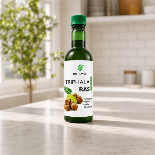Nutravel Triphala Ras bottle on a bright kitchen counter