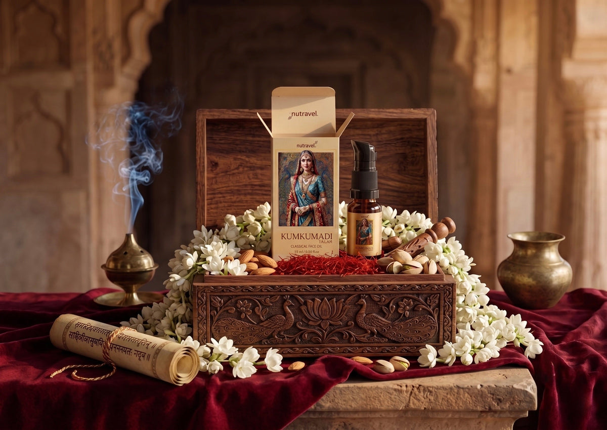 Kumkumadi Tailam box and bottle in a carved wooden chest with jasmine and saffron
